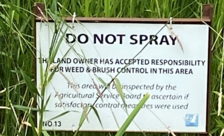 No spray sign in field